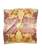 Close-up of hand-painted brushstroke details on Breezify silk scarf